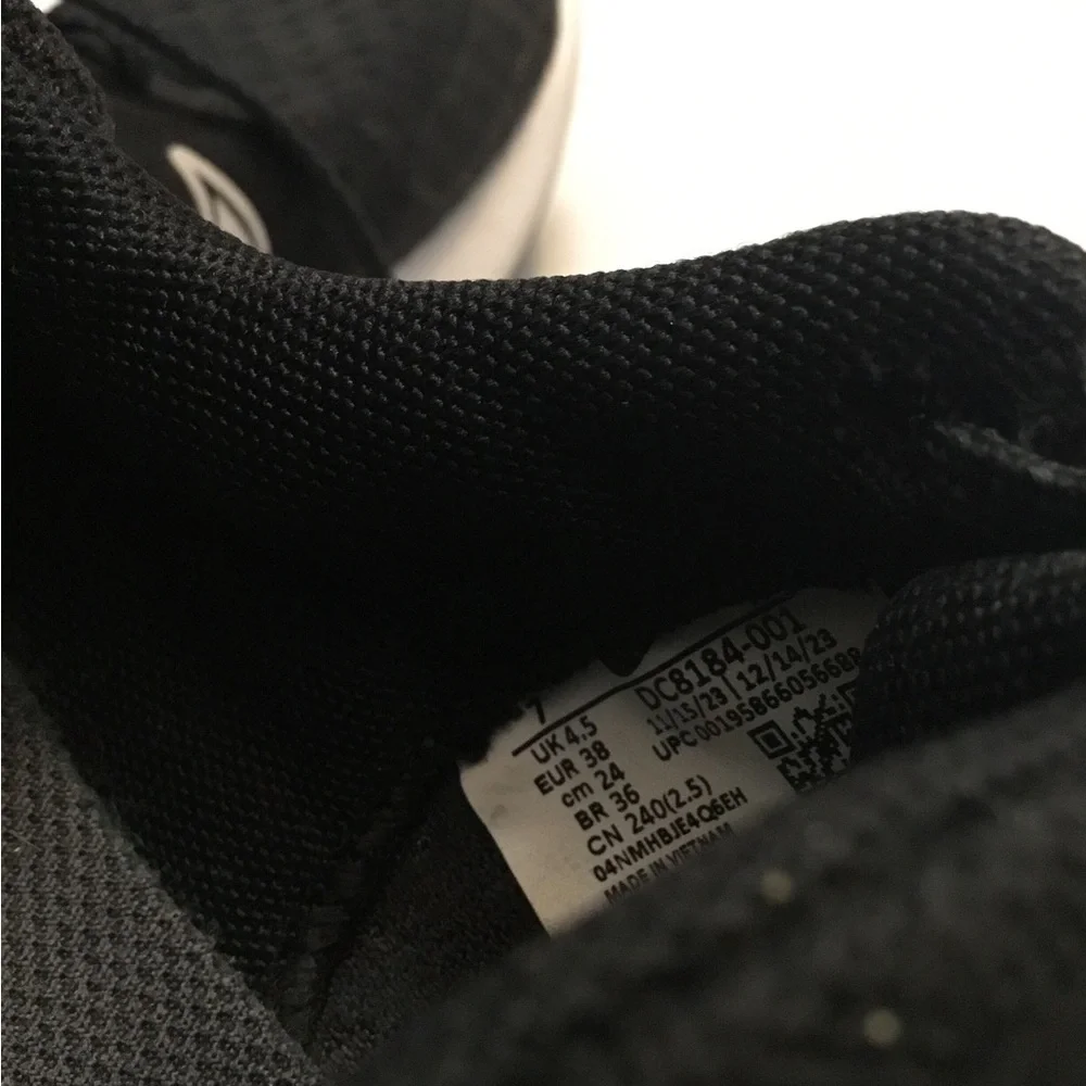 Nike Black Sneakers with White Swoosh